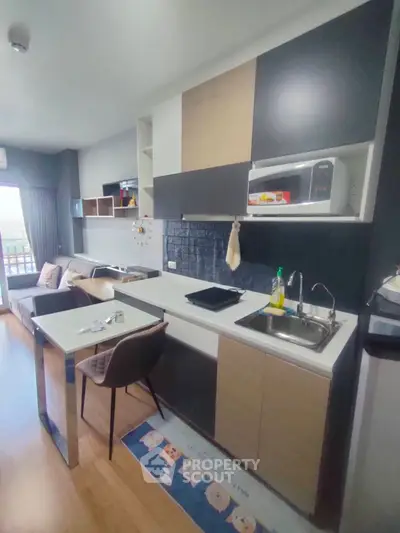 Modern kitchen with sleek design and open layout in a stylish apartment
