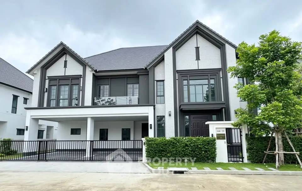 Stunning modern house with sleek design and lush greenery, perfect for luxurious living.