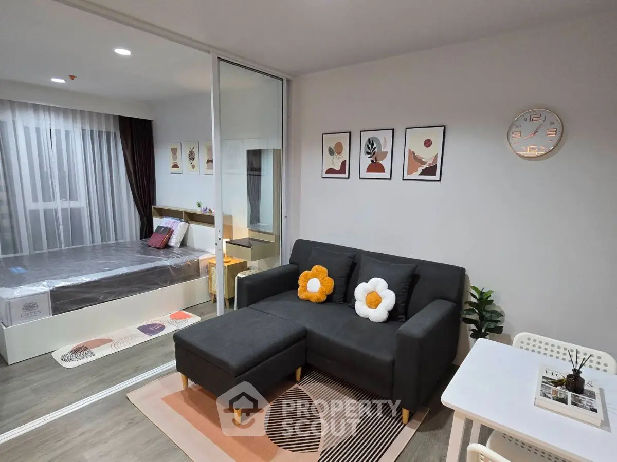 Modern studio apartment with stylish decor and cozy living area