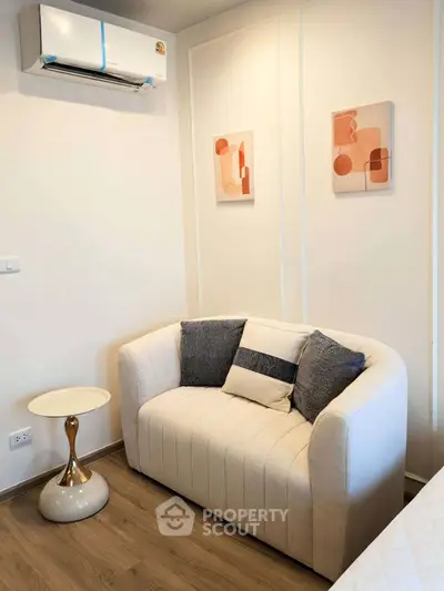 Cozy living room corner with modern sofa and stylish decor