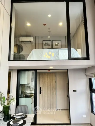 Modern duplex apartment with stylish mezzanine bedroom and open living area