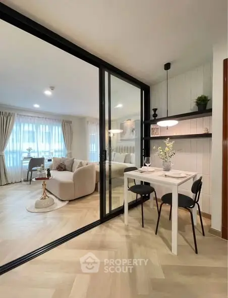 Modern open-plan living room with elegant dining area and stylish decor