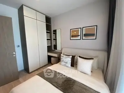 Modern bedroom with stylish decor and ample storage space