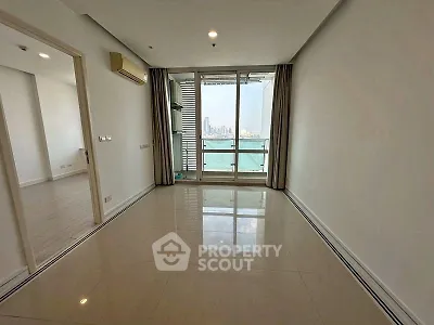 Spacious modern living room with city view and large windows