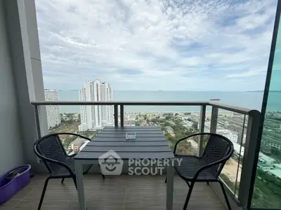 Stunning balcony view with ocean backdrop, perfect for relaxation and enjoying the scenery.