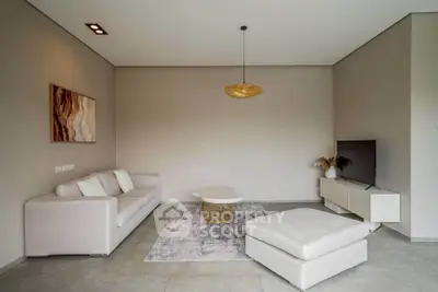 Modern minimalist living room with sleek furniture and neutral tones, perfect for stylish urban living.