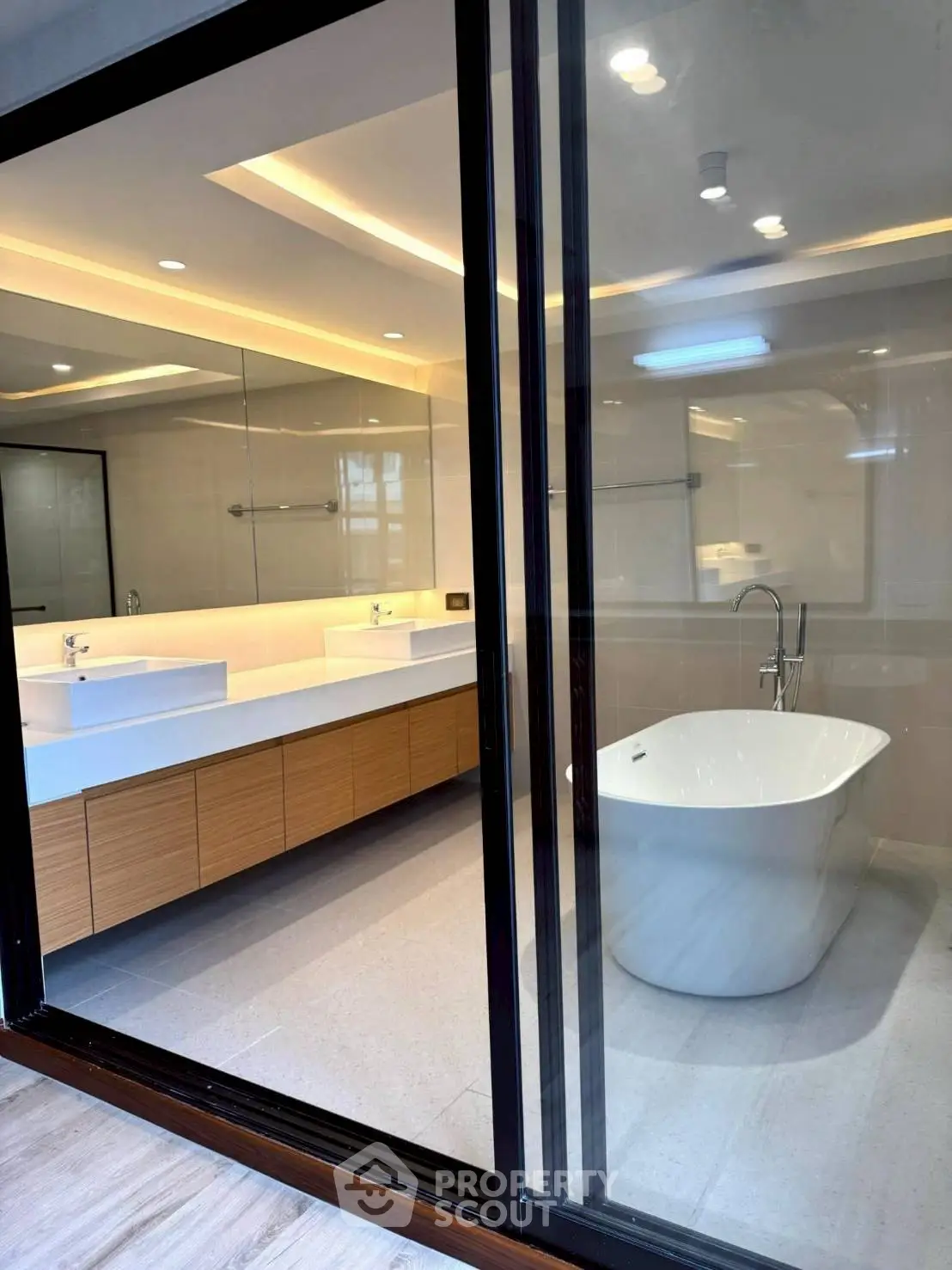 Luxurious modern bathroom with freestanding bathtub and dual sinks