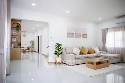 Spacious modern living room with elegant decor and open layout