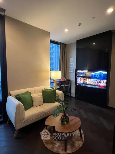 Modern living room with cozy sofa, stylish decor, and city view through large windows.