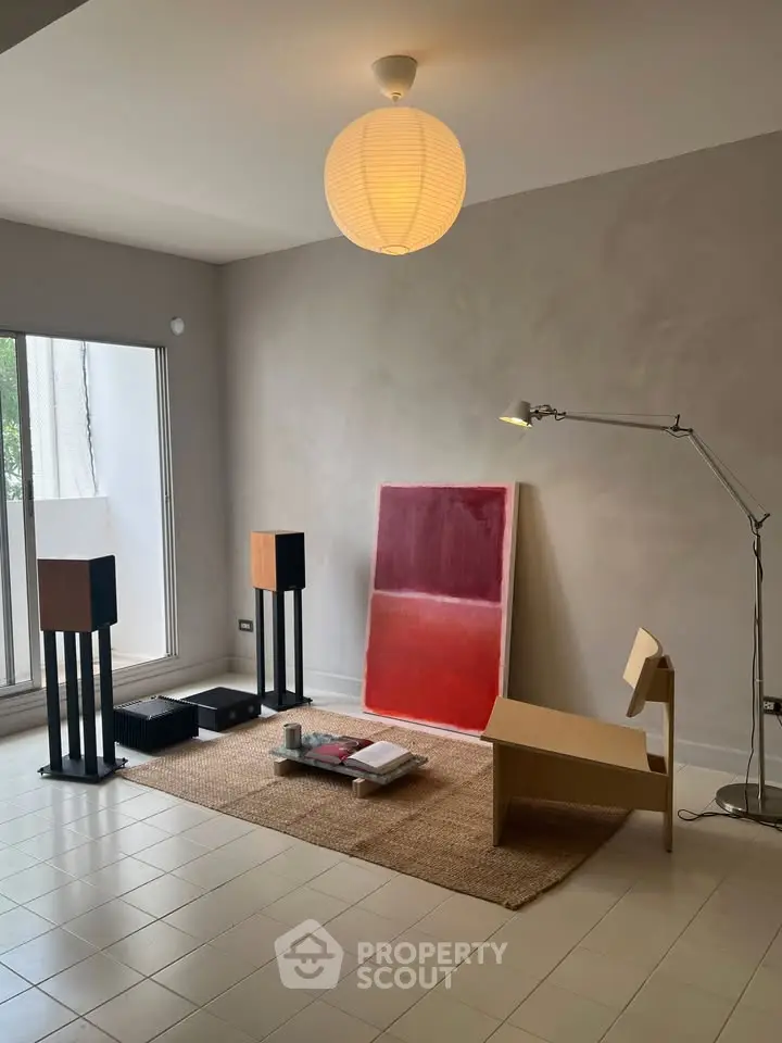 Modern minimalist living room with stylish decor and natural light