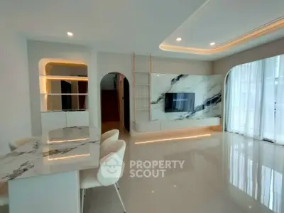 Luxurious modern living room with marble accents and sleek design