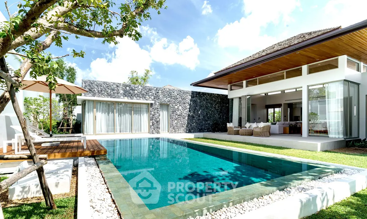 Luxurious modern villa with private pool and spacious outdoor area, perfect for relaxation and entertainment.