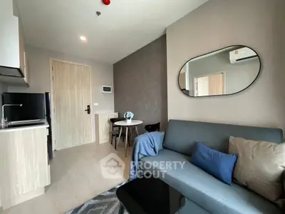 Modern living room with sleek furniture and cozy ambiance