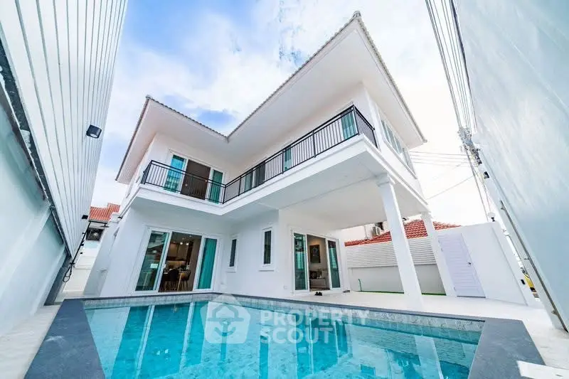 Stunning modern two-story house with private pool and spacious balcony.