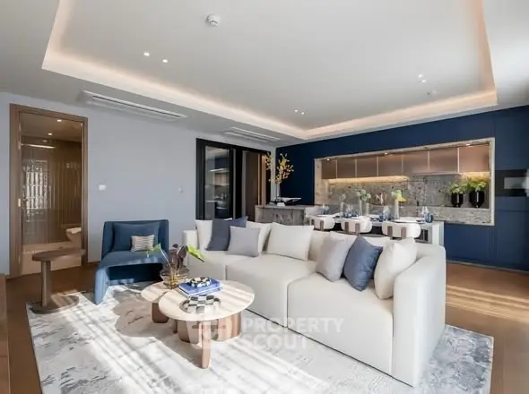 Luxurious modern living room with elegant decor and open kitchen layout, perfect for stylish urban living.