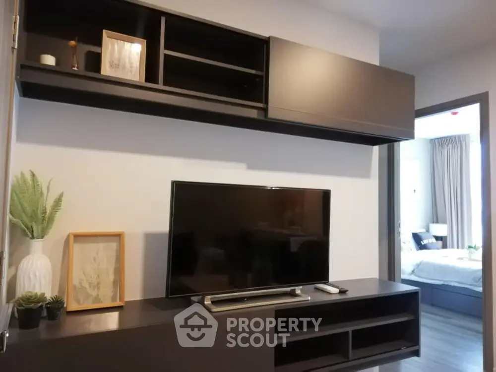 Modern living room with sleek TV unit and stylish decor