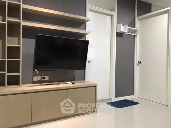 Modern living room with sleek TV unit and minimalist design