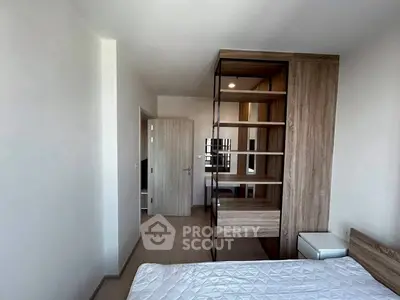 Modern bedroom with wooden partition and sleek design