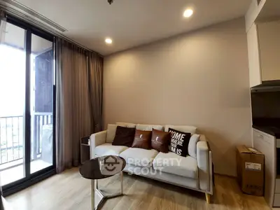 Cozy living room with modern decor and balcony view