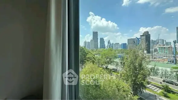 Stunning cityscape view from a high-rise apartment window, showcasing lush greenery and modern skyline.