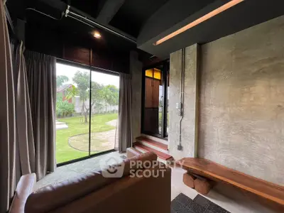 Modern living room with garden view and stylish interior design