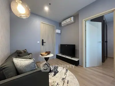 Modern living room with stylish decor and air conditioning