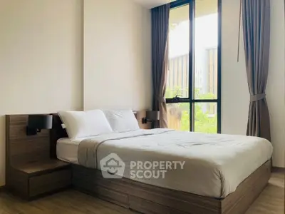 Modern bedroom with large window and stylish wooden furniture
