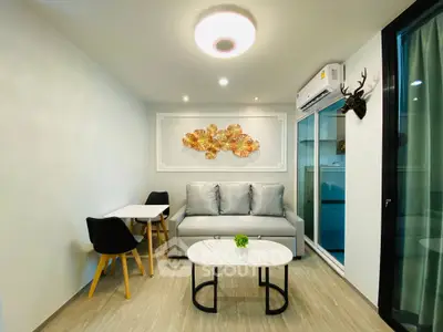 Modern living room with stylish decor and air conditioning in a cozy apartment.