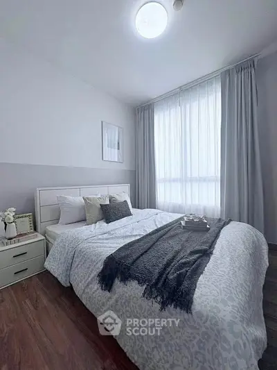 Cozy modern bedroom with soft lighting and elegant decor