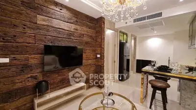 Luxurious living room with rustic wooden wall and elegant chandelier