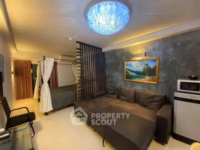 Stylish studio apartment with modern decor and cozy living area