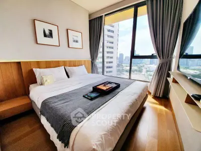 Luxurious bedroom with stunning city view and elegant decor