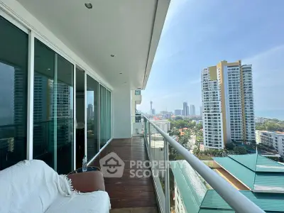 Spacious balcony with stunning city view in modern high-rise apartment
