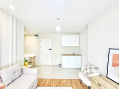 Bright and modern living room with stylish decor and wooden flooring