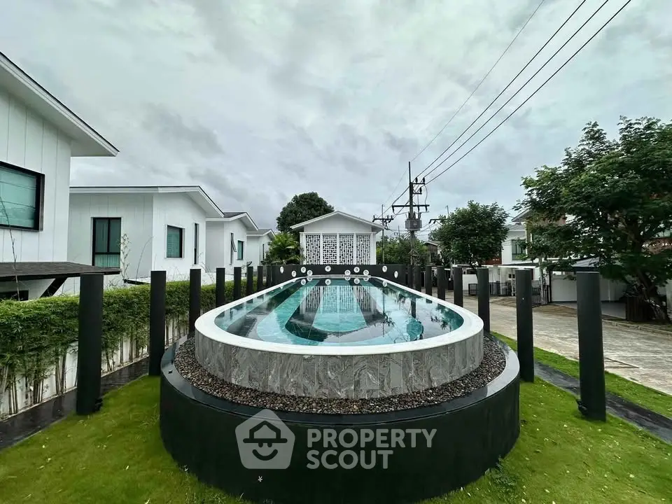 Modern house with unique elevated pool and lush garden