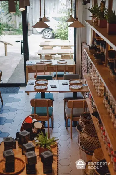 Charming cafe interior with modern decor and natural light, ideal for cozy gatherings.