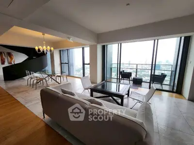 Luxurious living room with panoramic city view and elegant modern furniture.