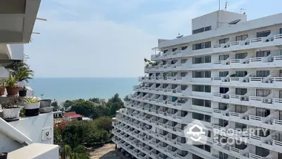 Stunning ocean view from modern apartment building balcony