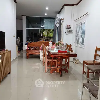 Spacious living room with elegant wooden furniture and modern decor