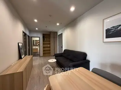 Modern living room with sleek furniture and open layout, perfect for urban living.