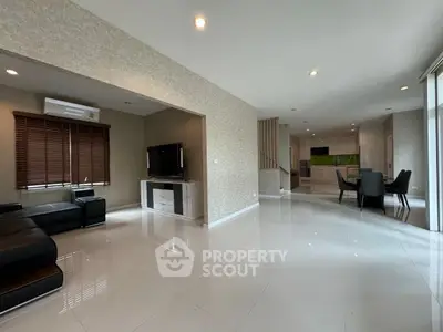 Spacious modern living room with open layout and sleek design