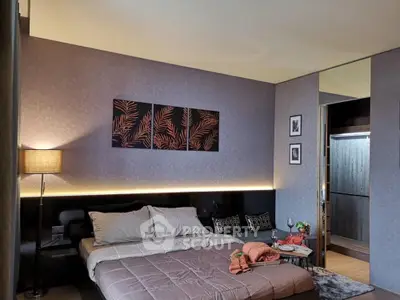 Luxurious bedroom with modern decor and ambient lighting, perfect for relaxation and comfort.
