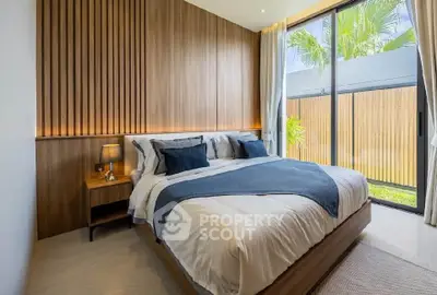 Modern bedroom with large window and stylish wooden paneling