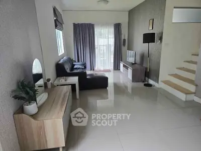 Modern living room with sleek furniture and natural light