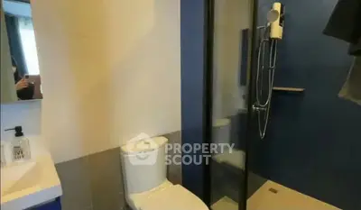 Modern bathroom with sleek shower and contemporary fixtures