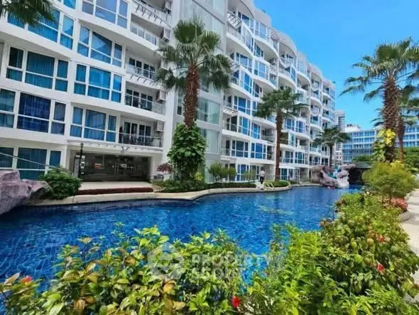 Luxurious condominium with stunning pool and lush greenery