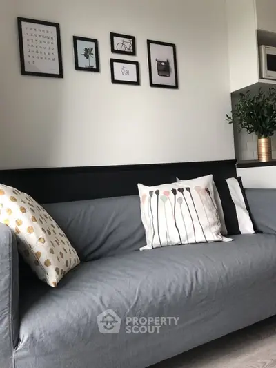 Cozy living room with stylish decor and comfortable sofa, perfect for relaxation.