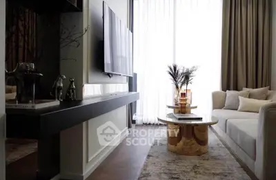 Luxurious living room with modern decor and large TV, featuring elegant furniture and floor-to-ceiling windows.