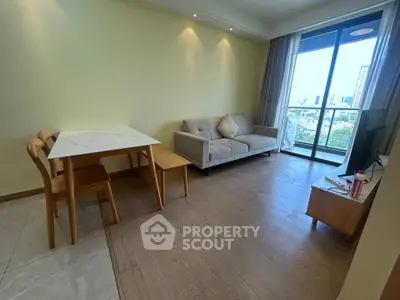 Modern living room with balcony view in urban apartment