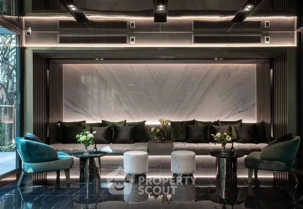 Luxurious modern lobby with elegant seating and marble accents